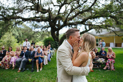 Bride and Groom First Kiss at Garden Wedding in Florida