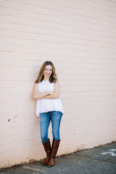 Nelia-25 white shirt against wall