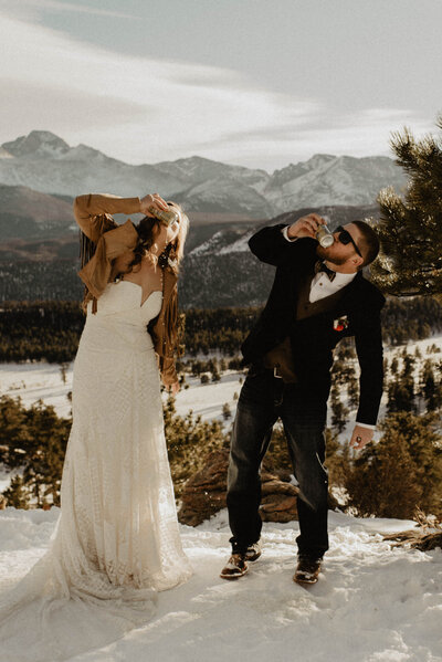 Florida elopement photographer, Anna Holden, holding her turkey harvest. 