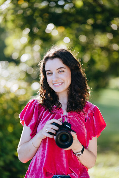 photo of saint louis photographer holding camera