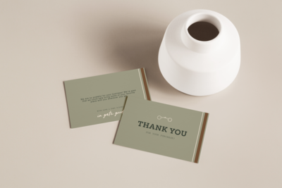 Mockup of thank you cards for an equestrian stationery company. Thank you cards on a slice of wood with palm tree shadow.