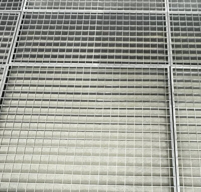 Female and male gathered around a table in a warehouse