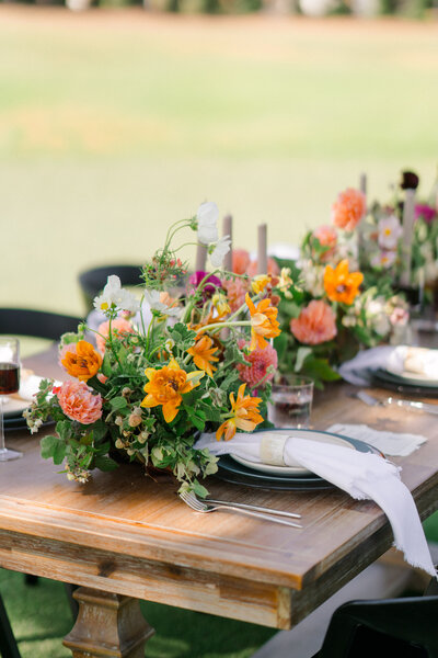 Bright floral tablescape for a wedding.