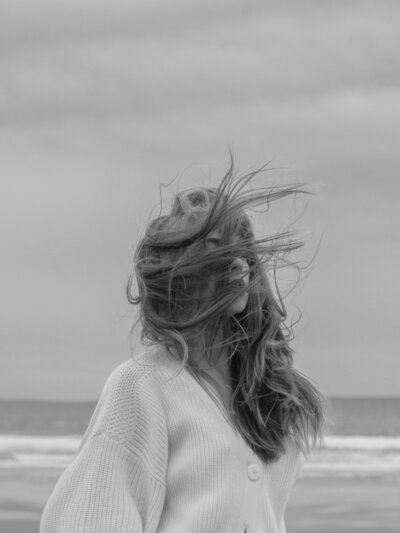 Woman posing on beach