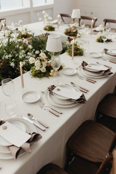 Detail shots of the table set up downstairs for the wedding reception at the Gem Event centre in Canmore