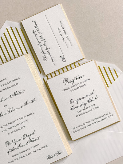 Black engraved wedding invitation suite with gold bevel edging and gold foil envelope liner on cranes lettra paper