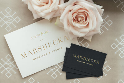 Black business cards and white notecards for luxury brand design