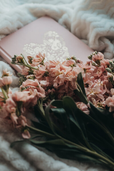 Pink flower and journal