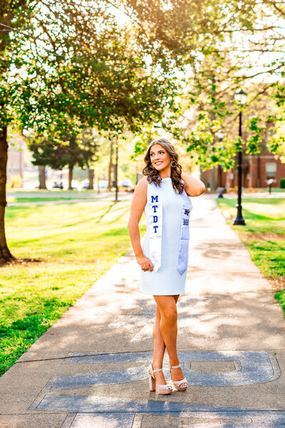 MTSU Dance Team senior photos on Raiders Walkway at Murfreesboro Campus during golden hour