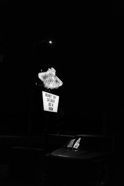 Bride and groom holding hands close up