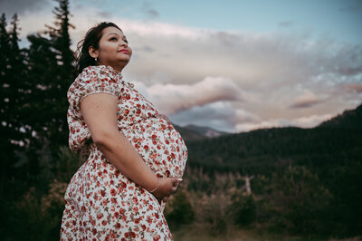pregnant woman in a floral dress