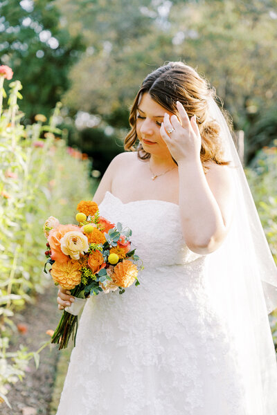 Bride holding colorful bouquet