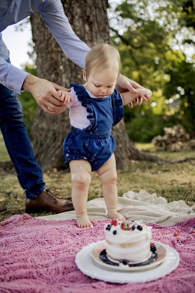 one year old girl and her dad at a session in carrollton texas