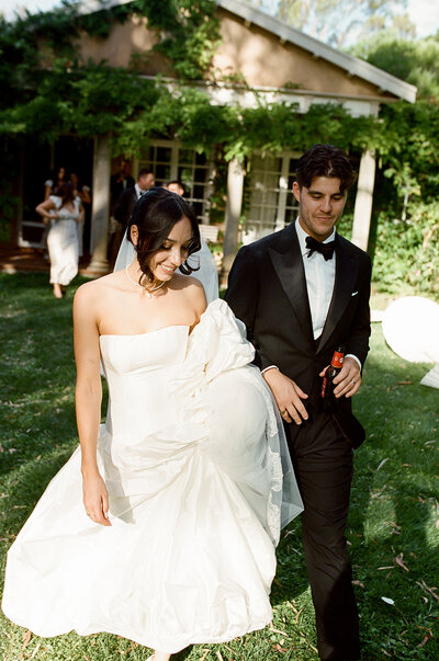 bride and groom embrace on wedding day in adelaide