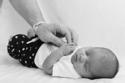 black and white image of newborn in hospital