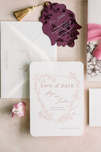 arched wedding invitation with tassel