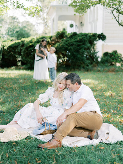 hands holding printed images by richmond family photographer