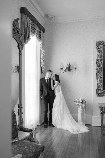 Bride and groom twirling in wedding gown by Vow'd Nashville in Nashville, Tennessee