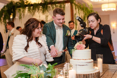 photographer documenting the cake cut