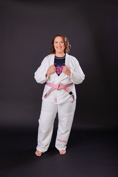 Kathryn Konicek wearing her gi and pink belt