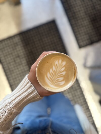 Latte with heart art made from single-origin Moxie Coffee at Grain Artisan Bakery, a gluten-free café in Snohomish, WA.