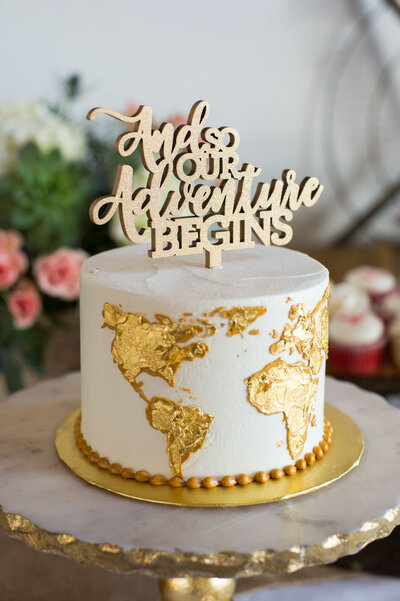 adventure cake vermont wedding with globe