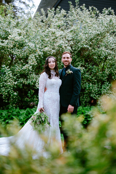Bride & groom couple portrait in the garden at House of Seven Gables in Salem, MA