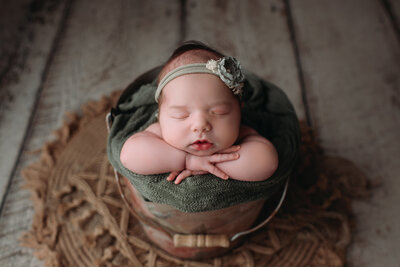 Oh those sweet cheeks and chubby arms. They won't stay this little for long so capturing these moments is so special. This image was captured by Paula Goforth in her newborn studio located in Fort Worth, Texas. 
