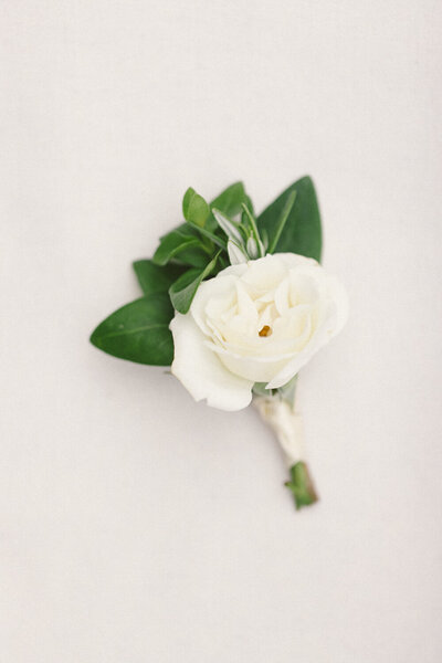 White flower with green leaves bouquet