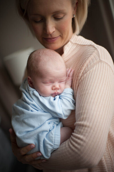Close-up photo of mom and her baby during a newborn photoshoot in Denver, Colorado