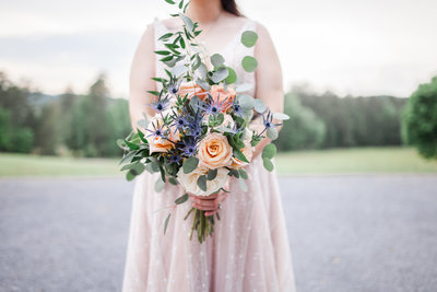 Bride holding a bouquet of flowers at her wedding in Atlanta Georgia.