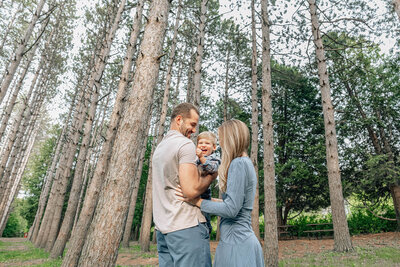 A family captured by Krop Kreative during a nature hike session—Lake Geneva lifestyle photography.