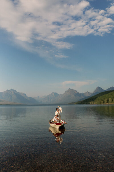 lake mcdonald elopement on canoe