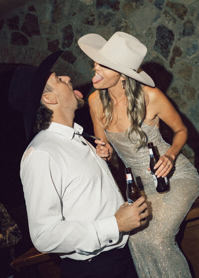 As the bride and groom made their grande entrance, family and friends shared their cheers and joy in preparation for the first dance between the two.