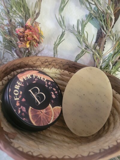 Stacked handmade soap bars containing every ingredient in Berry and balms inventory