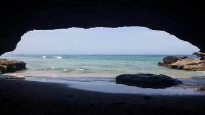 Australian coastline photo taken in a cave looking out to sea