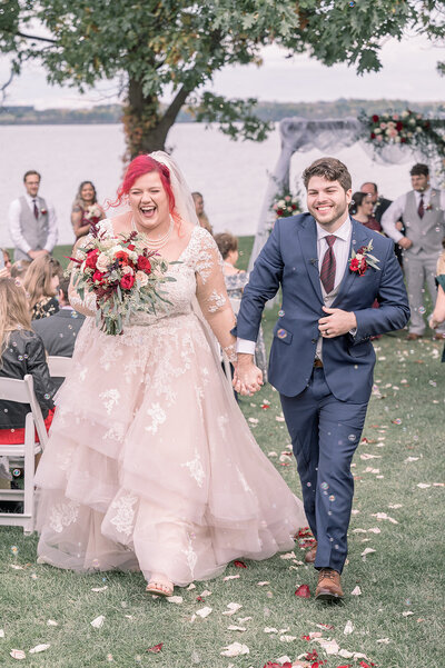 Bride and groom walking and dancing