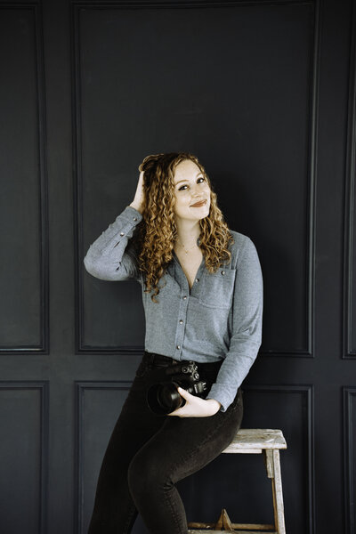 woman holding camera