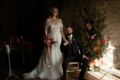Couple getting married in a barn