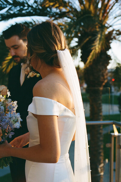 closeup of the bride's pearl veil