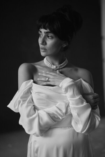 Flowing silk skirt and off-shoulder bridal crop top by british handmade designer Luna Bea