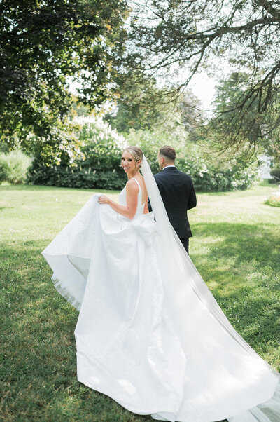 bride smiles back during upstate ny wedding