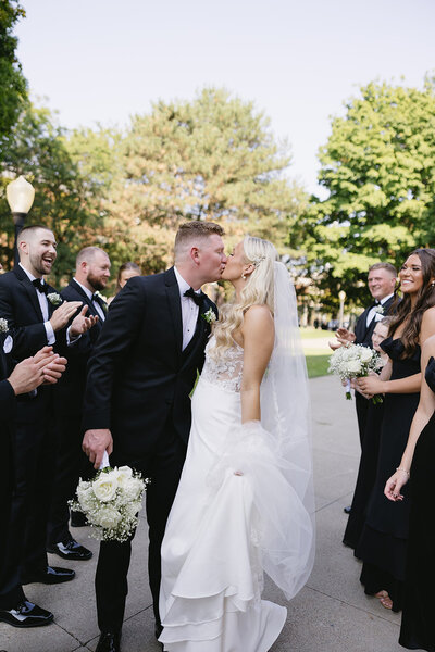 Bride and groom walk up memorial steps at their DC wedding