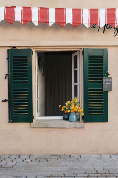 Lela Rose Avondale Park wedding dress for cobblestone old town portraits during a Bastide de Gordes summer wedding in Provence