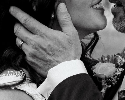 man holding woman's face