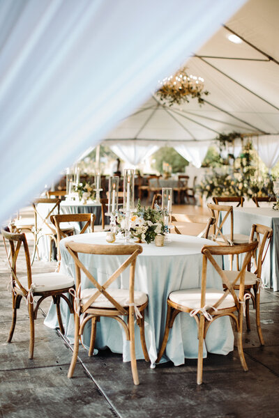 Luxury tables set up under tent for event