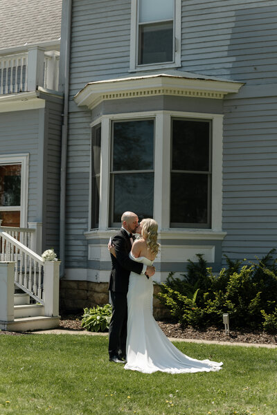 Couple sitting on porch before their wedding. Photo by Upper Case L Photography