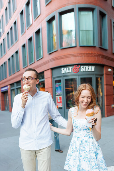 Bride leading groom engagement shoot