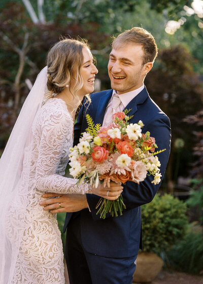 Bride and groom walk up memorial steps at their DC wedding