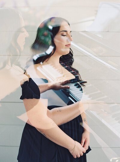 Double exposure photo of Mikaela Kahn live wedding vocalist and her playing the piano